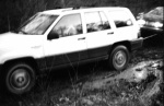 Lee's jeep pulling out the subaru.. 4 wheel spin, baby..